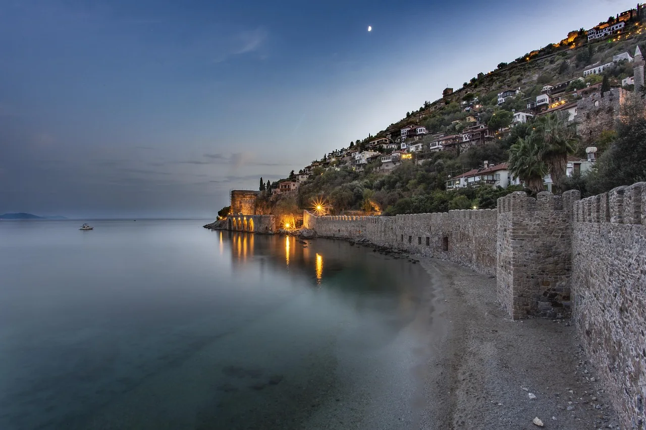 Panoramic view of Alanya harbor with the castle and Red Tower